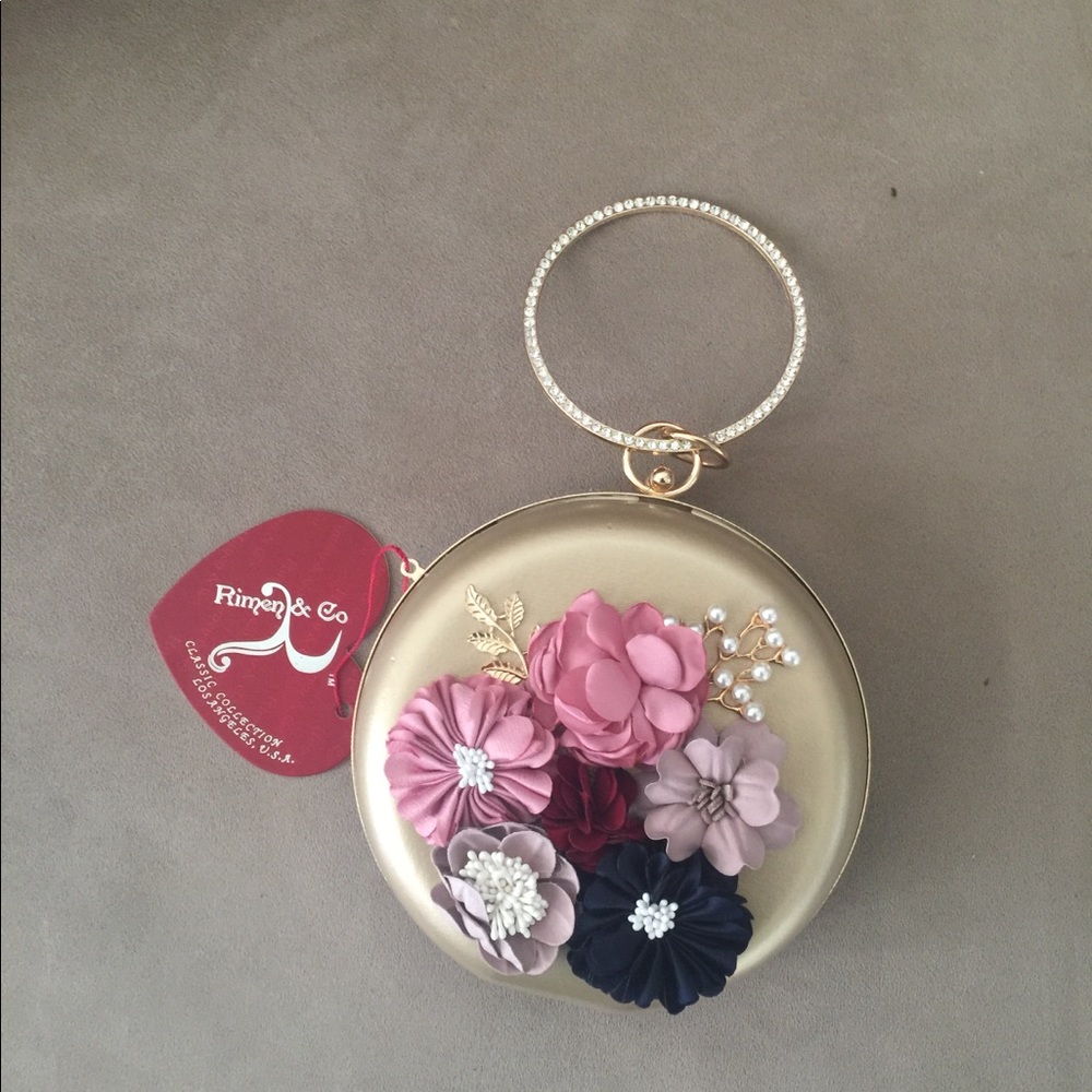 Hoop round clutch bag